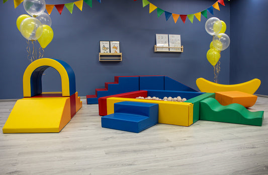 Multicoloured foam soft play party set with ball pit and slide for hire in Cheshire