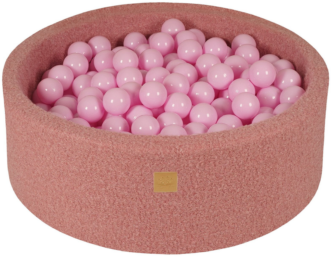 Pink bouclé baby ball pit for toddlers
