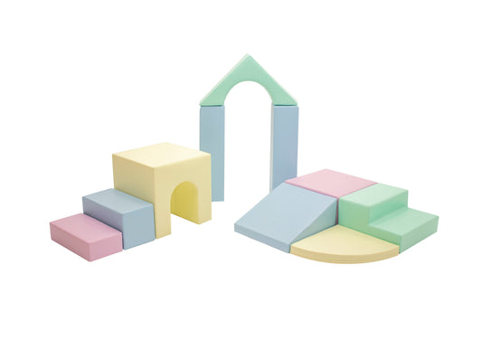 Pastel toddler foam soft play set arranged as steps, a den and a tunnel for a first birthday party
