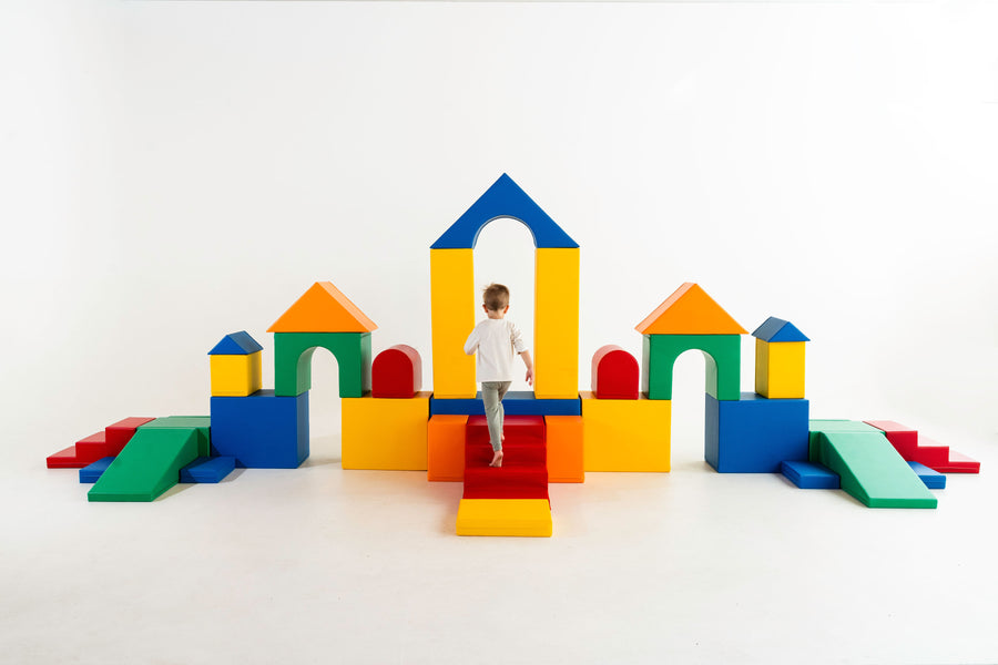 Foam soft play tunnel and slide forming part of a large combined party layout