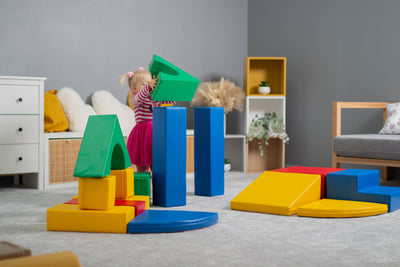 Toddlers playing on the Creativity soft play set