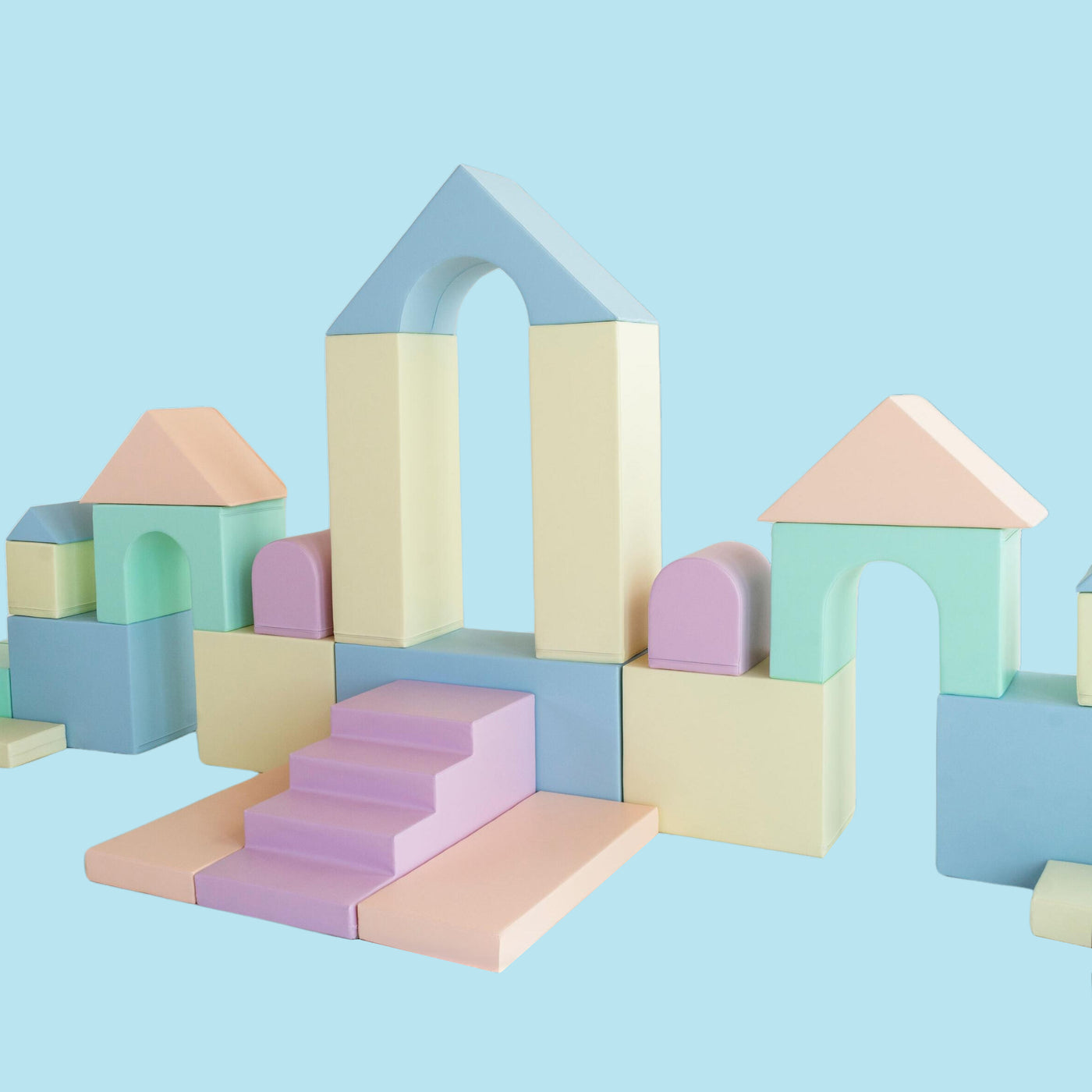 Pastel foam soft play set in soft pink, cream and mint, styled for a christening